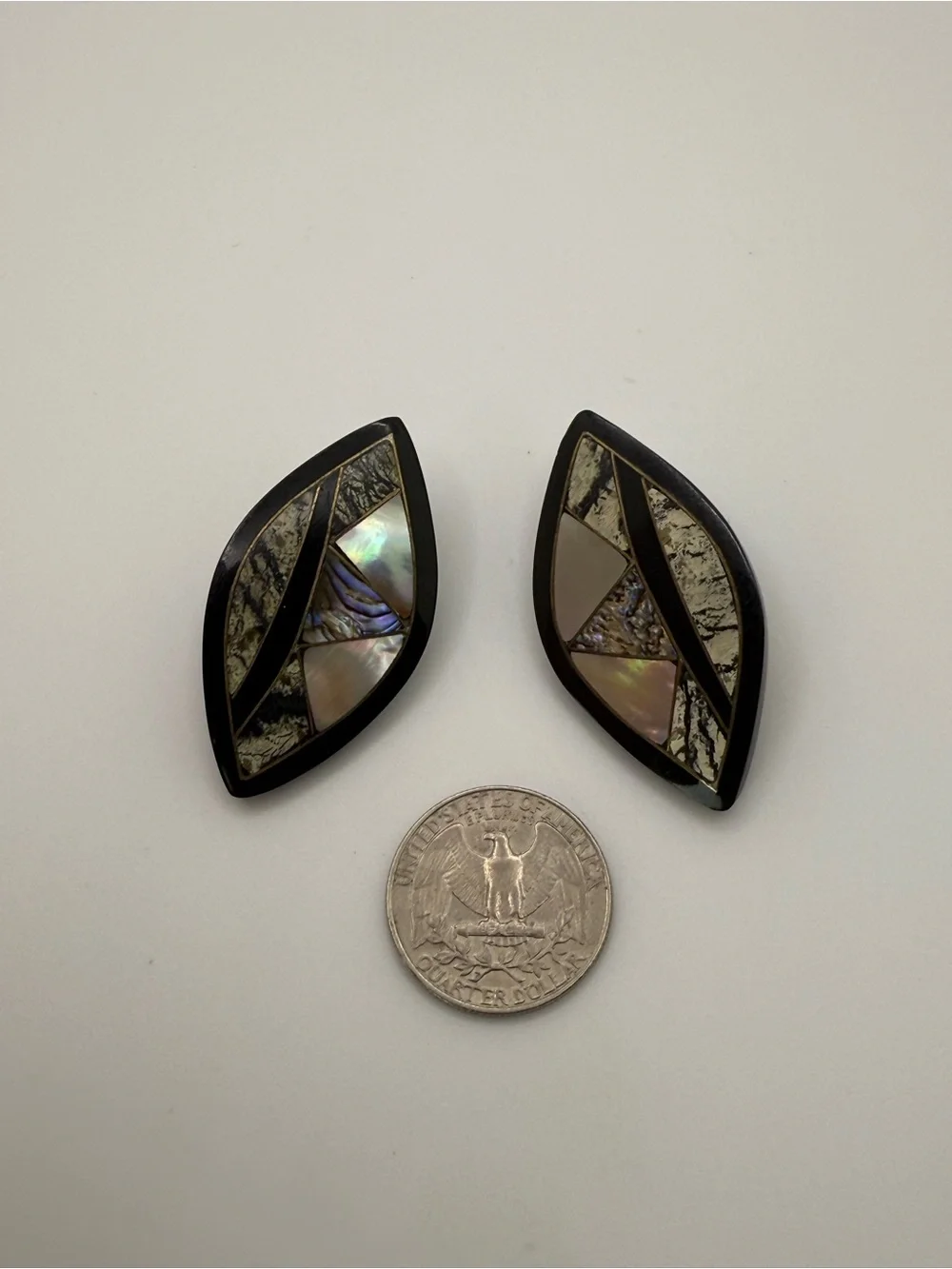 Leaf-shaped dark acrylic and mother of pearl earring